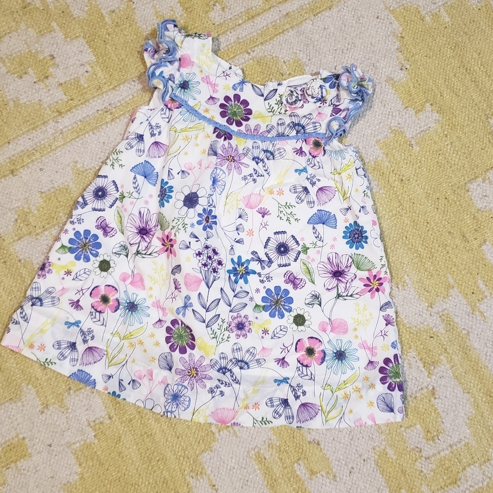 Vintage, floral ruffled sleeved dress.